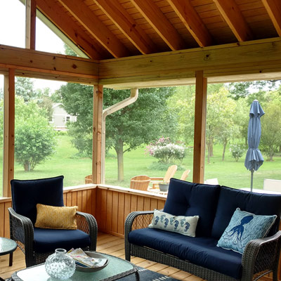 custom sunroom with patio furniture