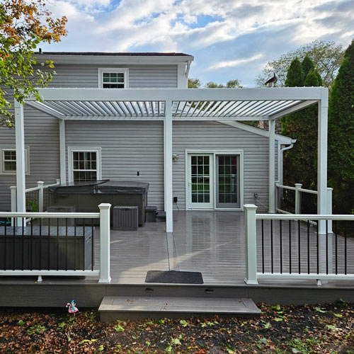 Trex deck in Avon with pergola with louvered shade roof sm